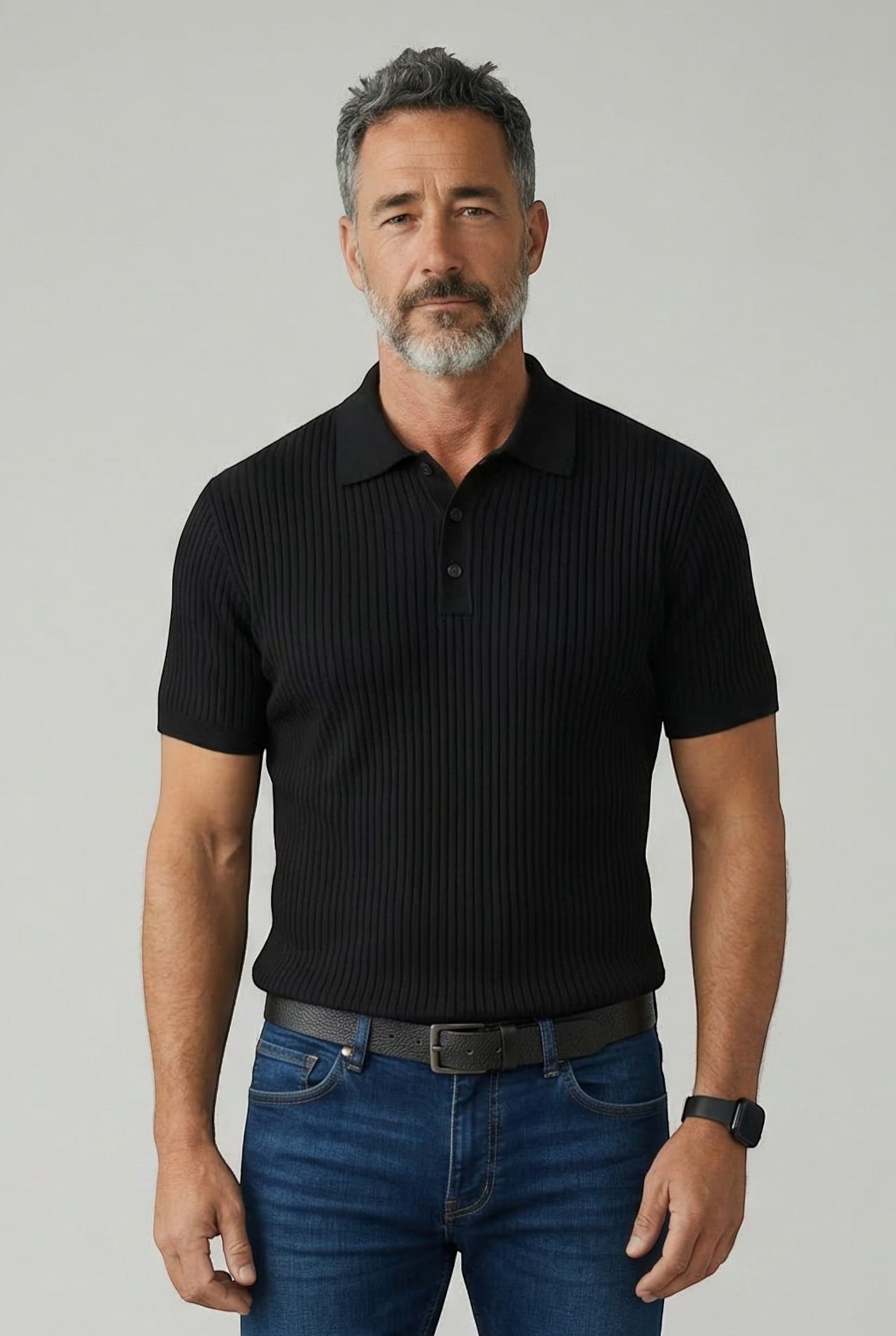 Tuck It black ribbed knit short-sleeve polo shirt with a button placket and collar.