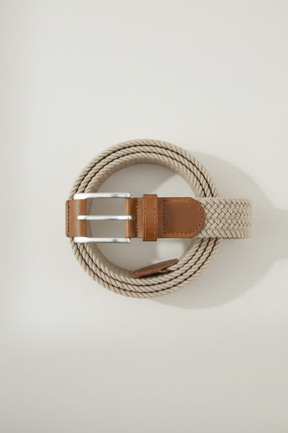Tuck It braided beige rope belt with brown leather details and silver buckle. Casual woven style.