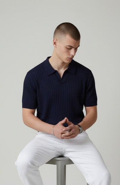 Tuck It navy blue ribbed knit short sleeve polo shirt with open collar.