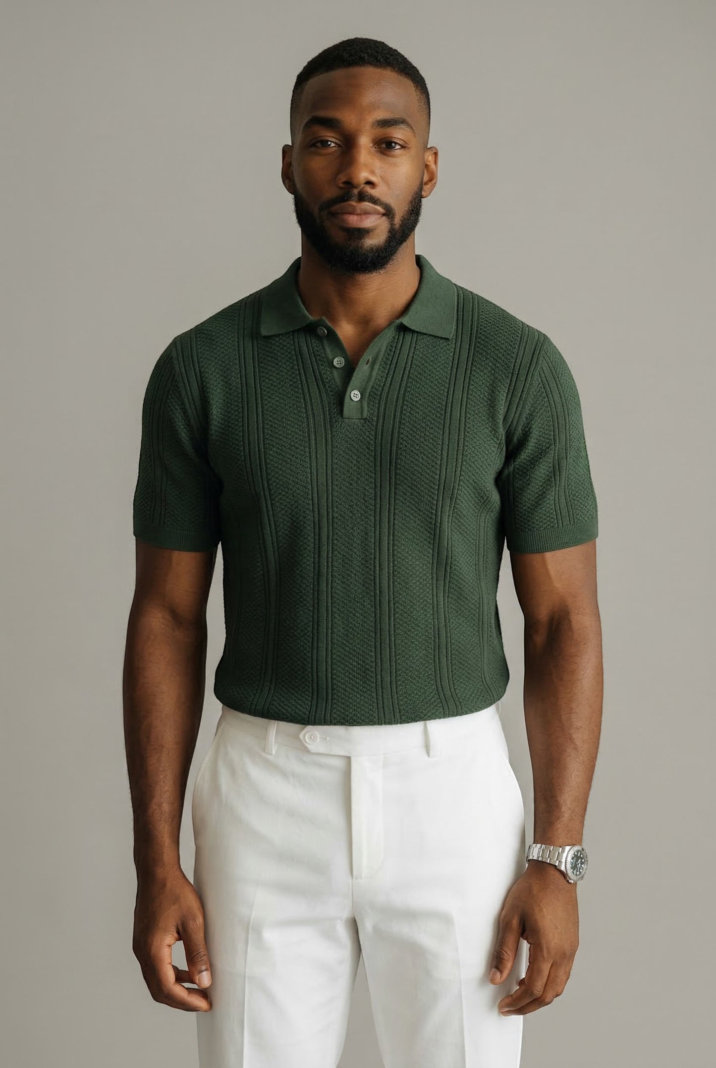Tuck It Verde Heritage Knit Polo shirt in dark green with a textured vertical stripe pattern and short sleeves.